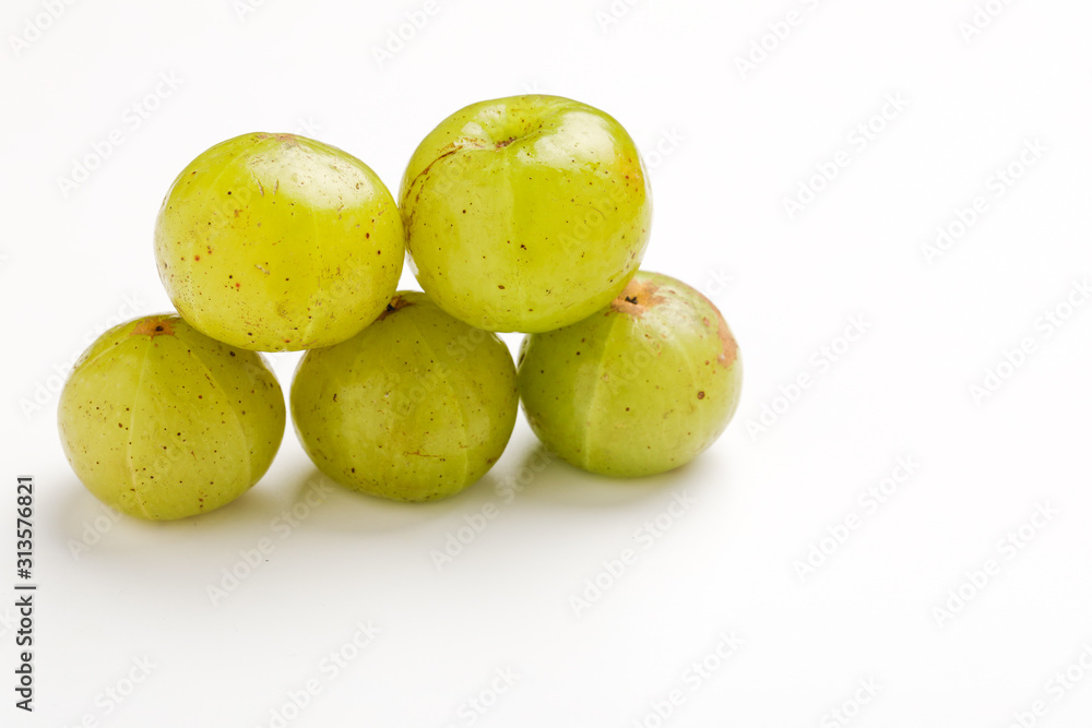 Fresh Indian gooseberry over white background Fresh Indian gooseberry over white background