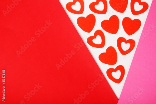 Red and pink flat background with hearts for Valentine Day celebration