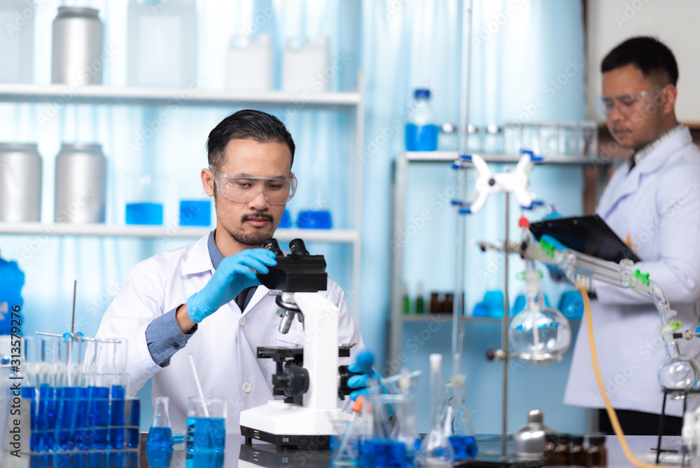 Health care researchers working in life science laboratory Health care researchers working in life science laboratory