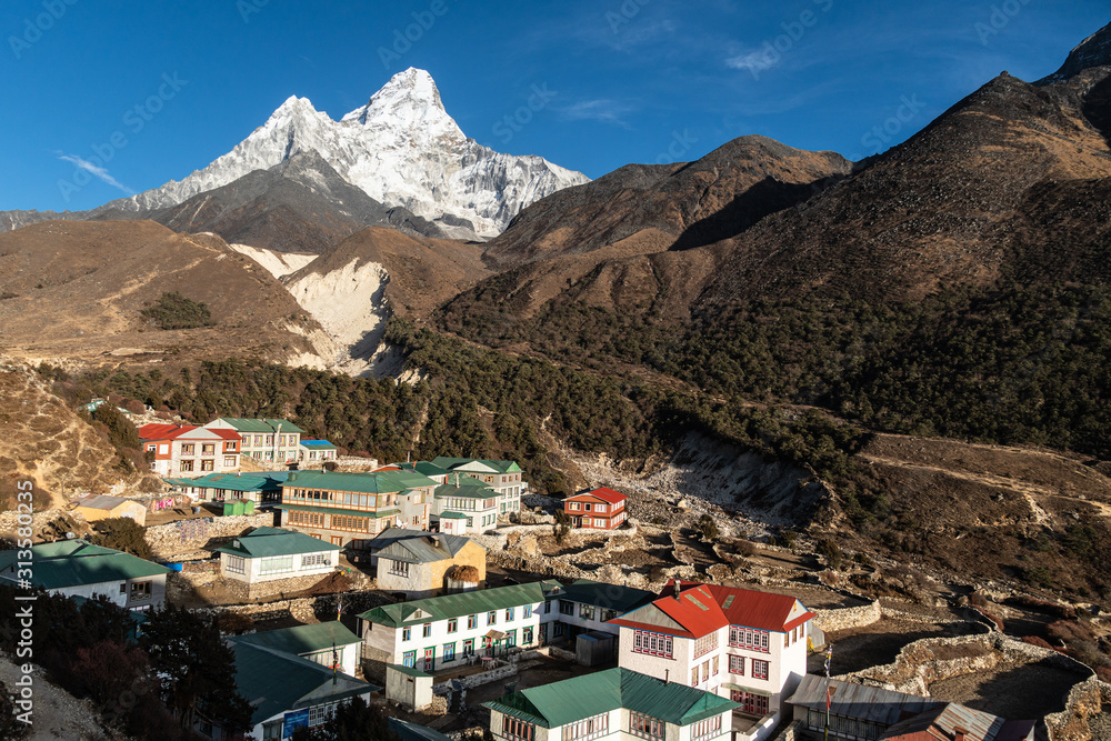 Pangboche village with many tea houses and lodges at the feet of the Ama Dablam peak along the Everest base camp trek in the Himalayas in Nepal