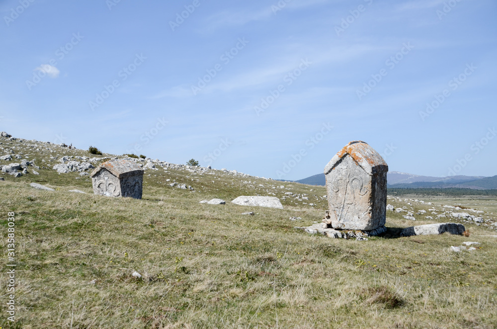 Stecak, monumental medieval tombstones. Stećci were inscribed as a
