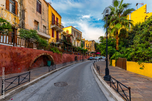 Fototapeta Naklejka Na Ścianę i Meble -  Street in the old town of Chania, Crete, Greece. Charming streets of Greek islands, Crete. Beautiful street in Chania, Crete island, Greece. Summer landscape. Chania old street of Crete island Greece.