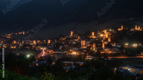Night view on Mestia with its illuminated Svan Towers. Svaneti, Georgia. © k_samurkas