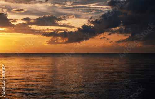Sea Sunset. Seascape. Ocean and red sky with clouds