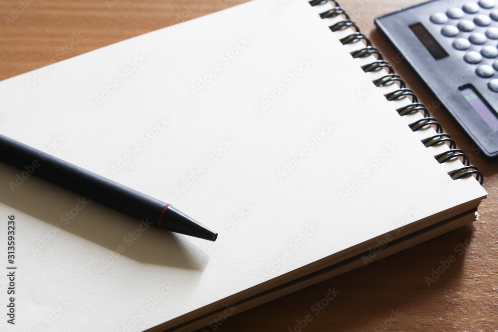 Notebook and pen stationery on the table. Notebook and pen stationery on the table.
