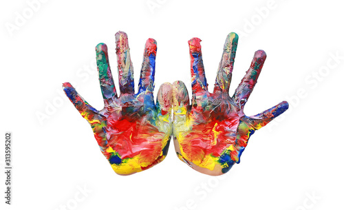 Close up kid hands painted in colorful paints isolated over white background.