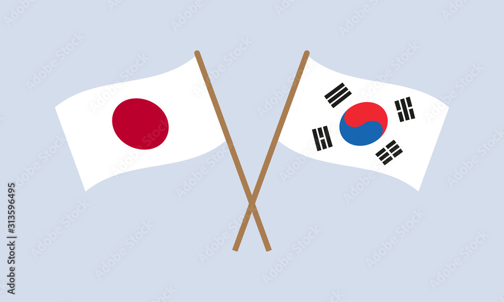 Japan and South Korea crossed flags on stick. Japanese and South Korean