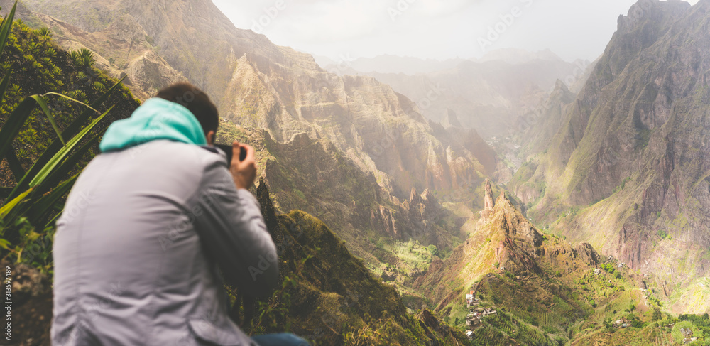 Santo Antao Island, Cape Verde. Travel hiker photographing unique surreal amazing Xo Xo valley and mountain cliffs