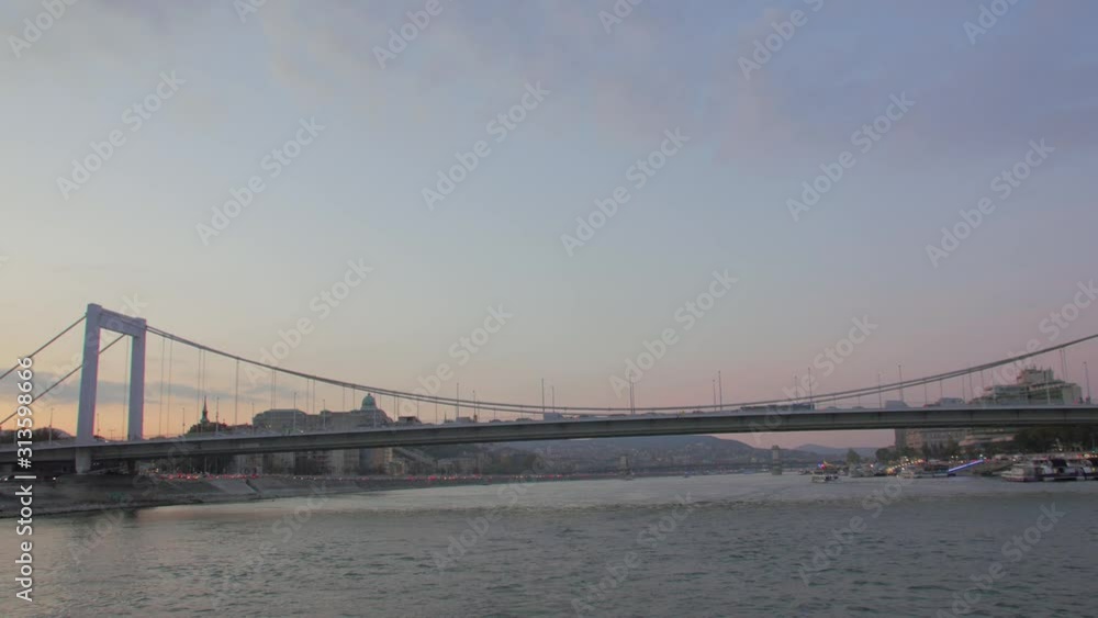 Departure on boat by the river POV Budapest Hungary Elisabeth Bridge dusk evening cityscape view Departure on boat by the river POV Budapest Hungary Elisabeth Bridge dusk evening cityscape view