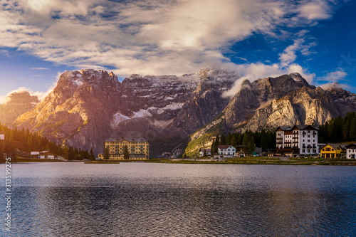 Tre Cime di Lavaredo peaks seen from Misurina lake in Dolomites, Italy in winter, Belluno-Trentino Alto Adige border. Misurina lake, Tre Cime di Lavaredo, Auronzo, Dolomiti, South Tyrol, Italy. photo