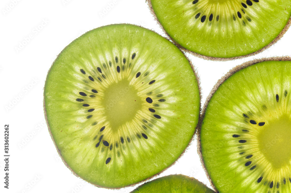 round kiwi slices on a white background. Isolated on white round kiwi slices on a white background. Isolated on white