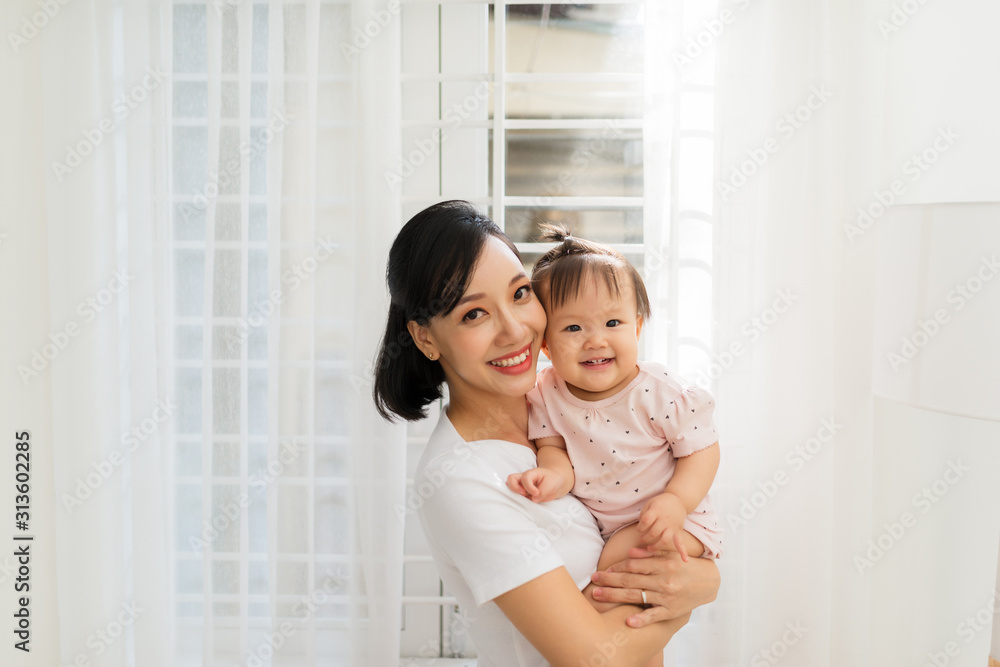 Happy Mother and daughter hugging Happy Mother and daughter hugging