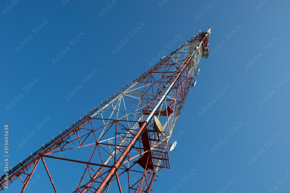 Upward of Communication Radio antenna Tower , microwave antenna tower on blue sky Upward of Communication Radio antenna Tower , microwave antenna tower on blue sky