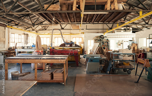 Quadro su tela Interior of a large woodworking studio full of machinery