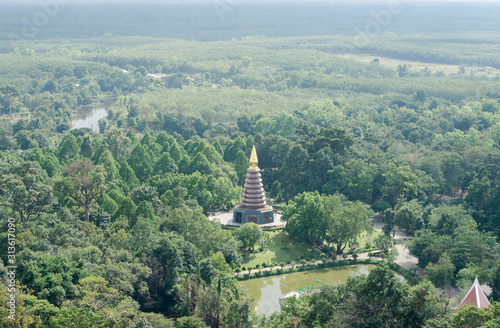 View of a wooden walkway that stretches along the cliffs of Jetiyakiri Temple (Phu Thok Temple) in Bueng Kan Province. photo