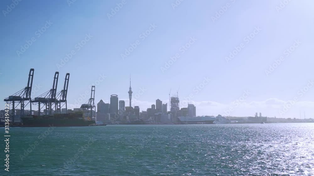 SLOWMO - Shot of Auckland Sky Tower and harbour from ferry, New Zealand SLOWMO - Shot of Auckland Sky Tower and harbour from ferry, New Zealand