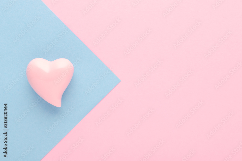 pastel pink background with a heart and copy space, soft focus pastel pink background with a heart and copy space, soft focus