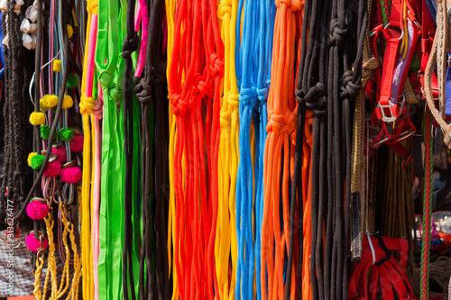 multicolor nylon rope hanged for sale at cattle market at tamilnadu, india