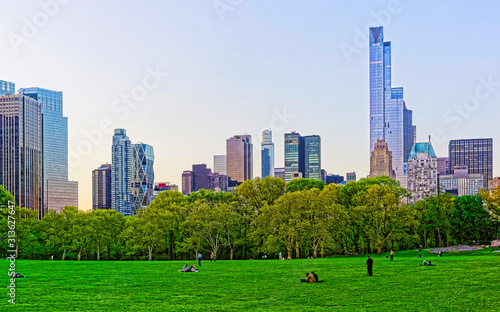 Central park South New York, great design for any purposes. Midtown Manhattan, USA. View with Skyline of Skyscrapers architecture in NYC. Nature background. Urban cityscape. NY, US