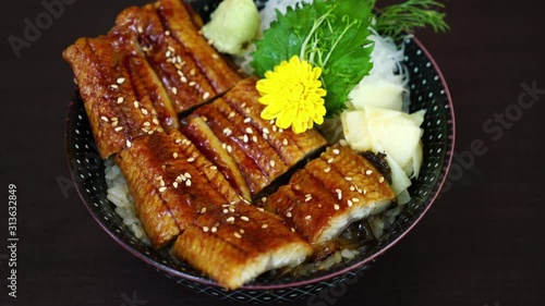 eel (Unagi) on topped rice bowl (donburi) - Japanese food style photo