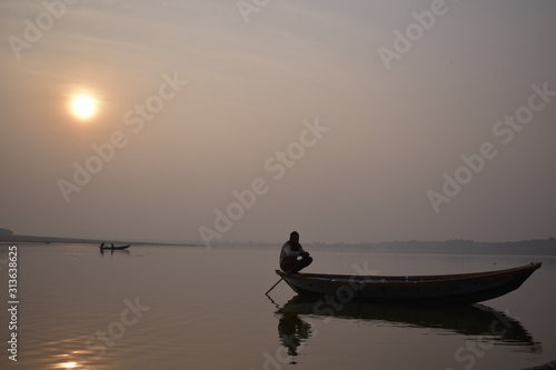 fisherman at sunset © umang