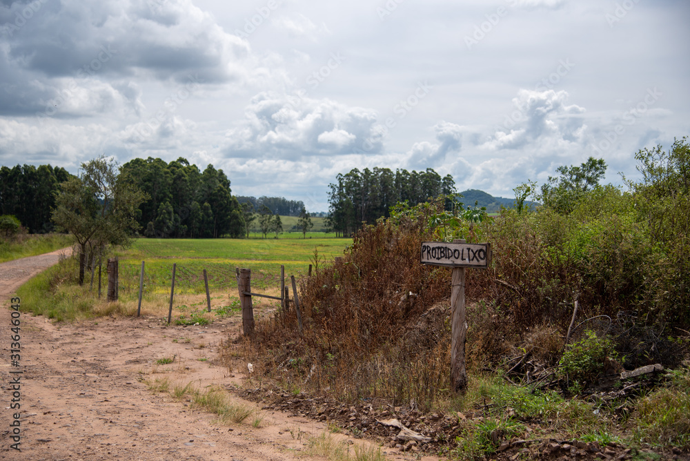 Rural landscape in Brazil and the sign 