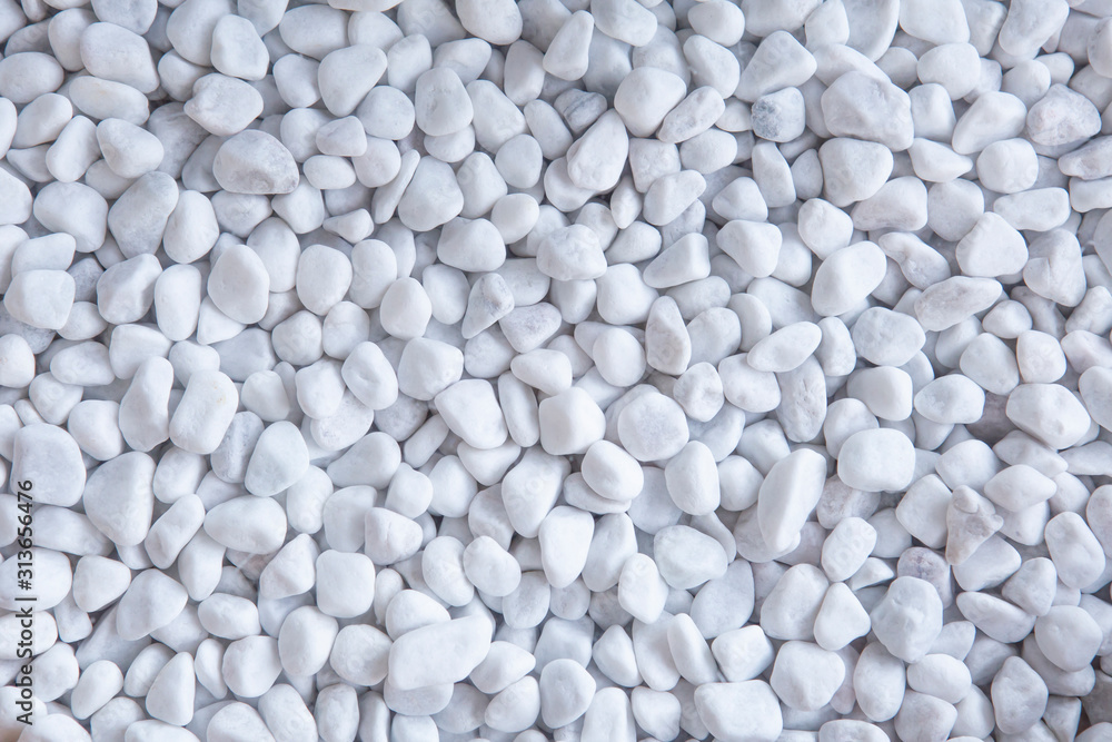 White pebbles texture or background. White gravel background. White pebbles texture or background. White gravel background.