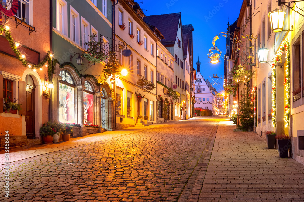 Decorated and illuminated Christmas street and Market square in medieval Old Town of Rothenburg ob der Tauber, Bavaria, southern Germany