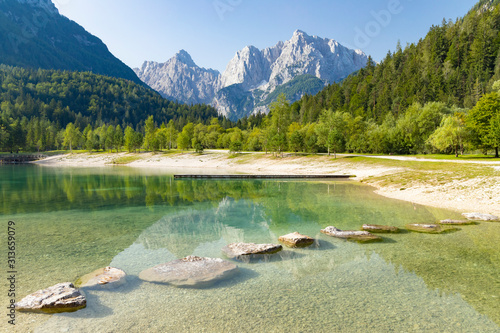 Lake and mountains near Kranjska Gora  village in Triglav national park, Slovenia photo
