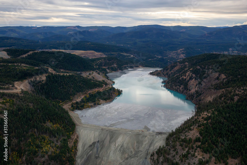 Aerial view of Copper Mine Tailing pond in the interior British Columbia, Canada. Taken during a fall season sunset.