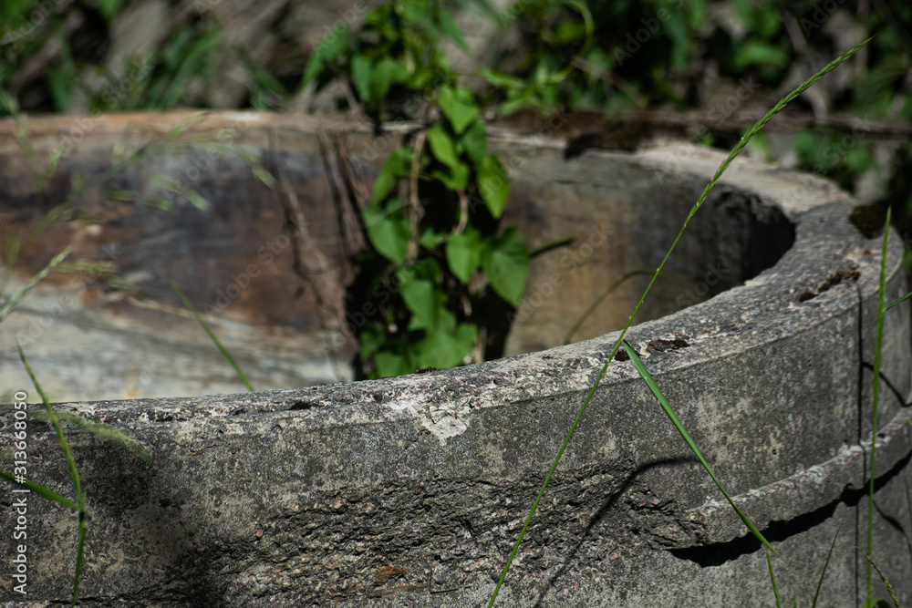 Fototapeta premium Abandoned old concrete ring is close