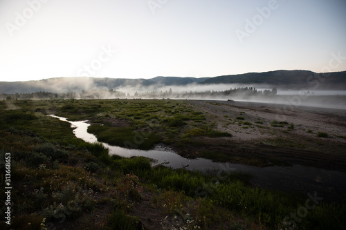 Mist rises over the Upper Snake River in the John D. Rockefeller Jr. Memorial Parkway photo