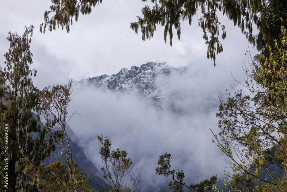 Fox glacier New Zealand. Clouds. Mountains