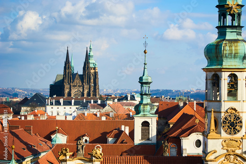 Loreta is a pilgrimage destination in Hradcany, a district of Prague, Czech Republic. Saint Vitus Cathedral background. Selective Focus