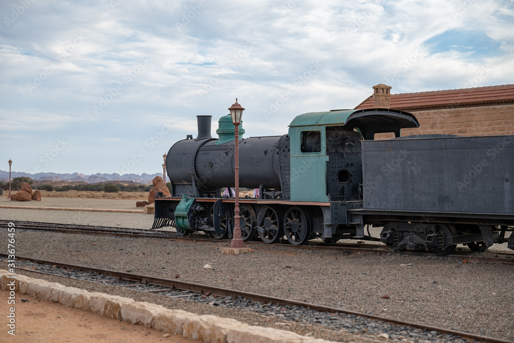 Train and carriages on the Hijaz Railway line at Mada'in Saleh (Hegra), Al Ula, Saudi Arabia 
