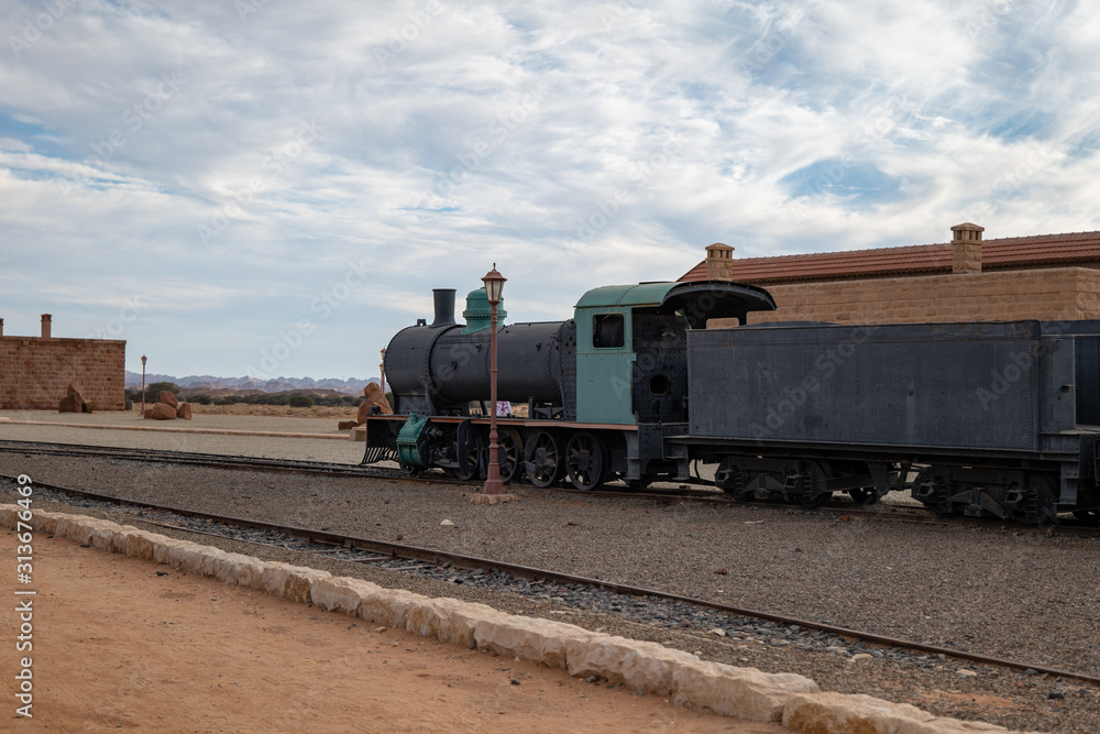 Train and carriages on the Hijaz Railway line at Mada'in Saleh (Hegra), Al Ula, Saudi Arabia Train and carriages on the Hijaz Railway line at Mada'in Saleh (Hegra), Al Ula, Saudi Arabia