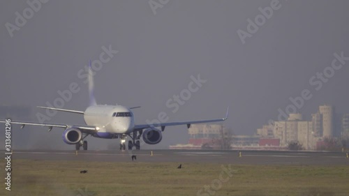 Airplane (aircraft) taking off at sunset