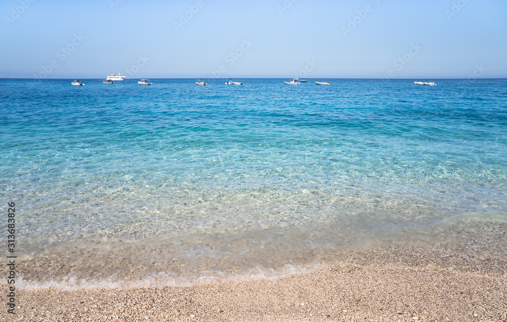 Fototapeta premium Clear azure coloured sea water, Sardinia, Italy