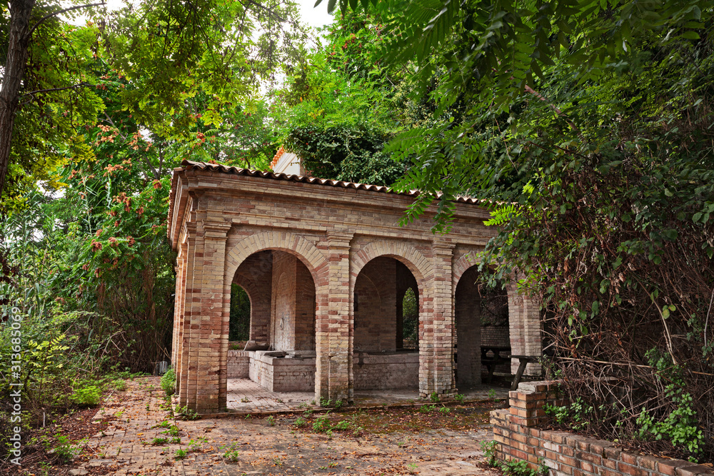 San Vito Chietino, Chieti, Abruzzo, Italy: The ancient fount Fonte Grande (1914) in the wood of the picturesque Italian town on the Adriatic sea coast San Vito Chietino, Chieti, Abruzzo, Italy: The ancient fount Fonte Grande (1914) in the wood of the picturesque Italian town on the Adriatic sea coast