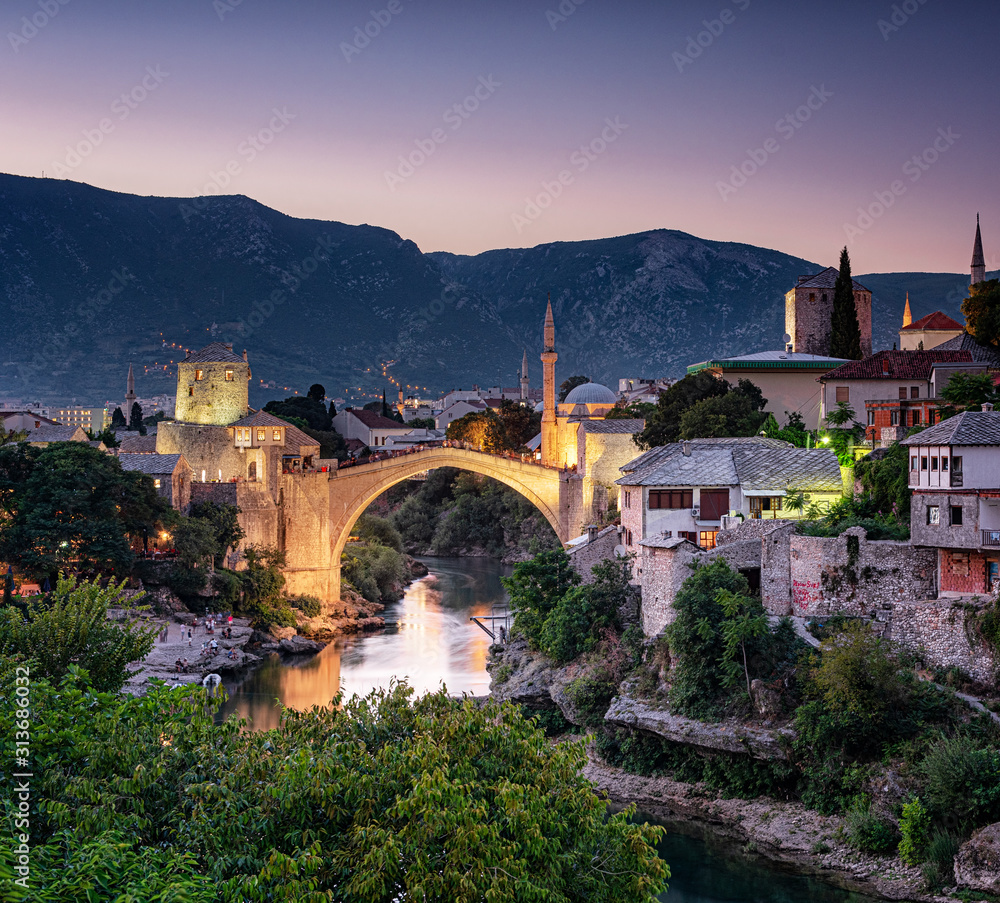 Colorful sunset over the medieval bridge of Mostar 