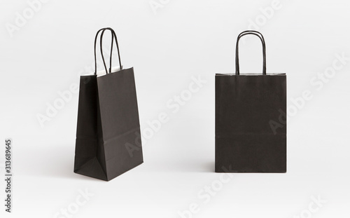 two very small black paper bag photo