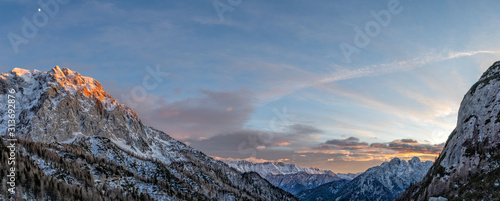 Quadro su tela julian alps mountains at sunset winter landscape