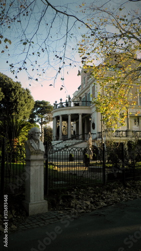 Historic Mansion with Classical Columns and Garden