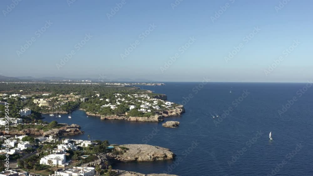 Beautiful Mallorca coastline at Cala d'Or. Numerous boats at sea. Aerial footage. Beautiful Mallorca coastline at Cala d'Or. Numerous boats at sea. Aerial footage.