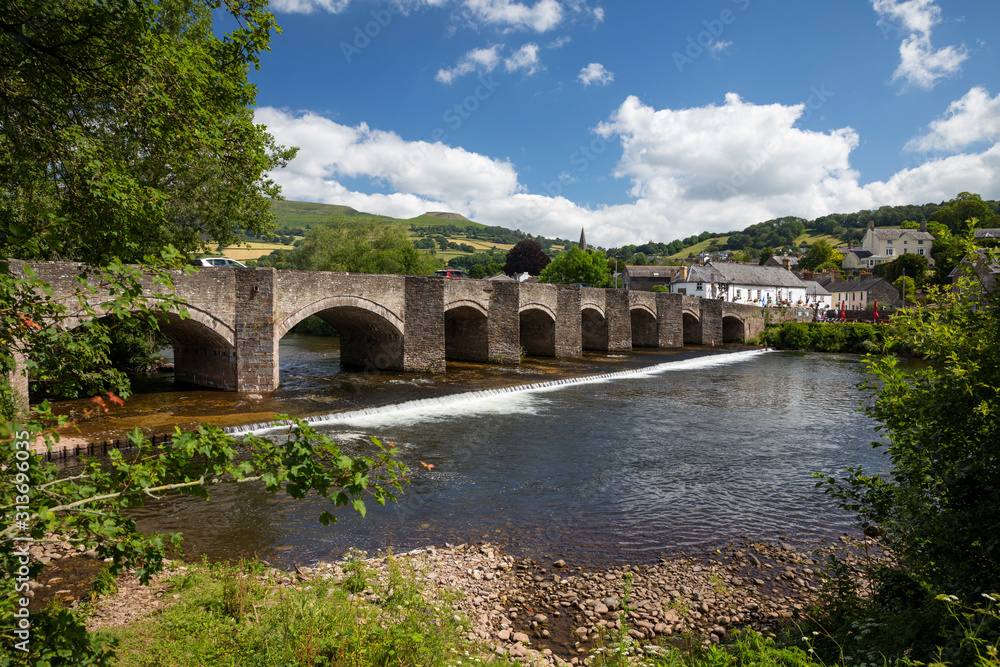 River Usk and 18th century stone bridge leading to Crickhowell, Powys, Wales