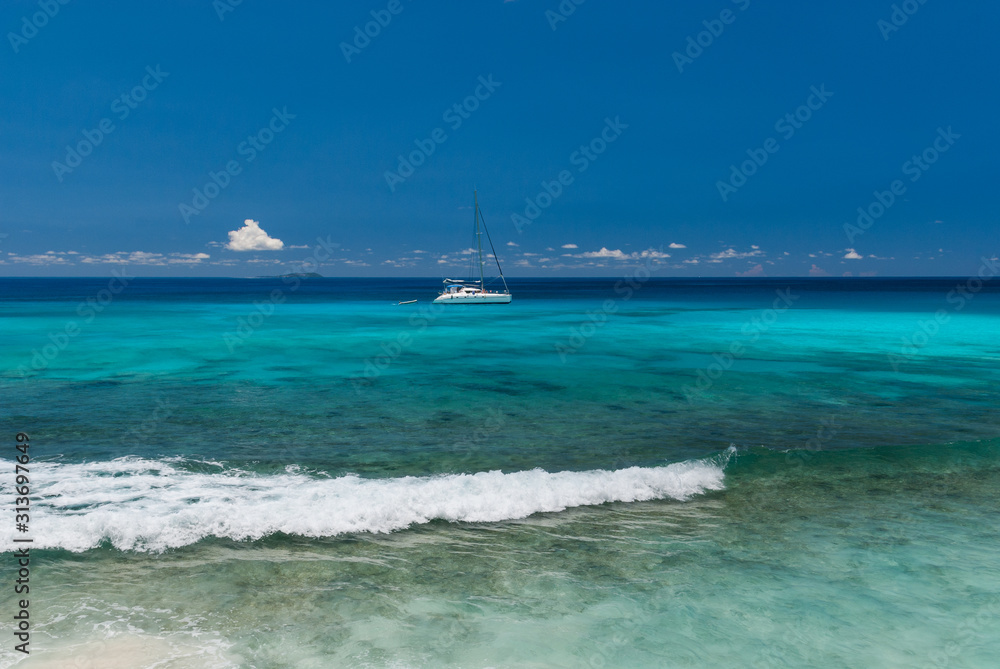 The yacht sails on the turquoise sea The yacht sails on the turquoise sea