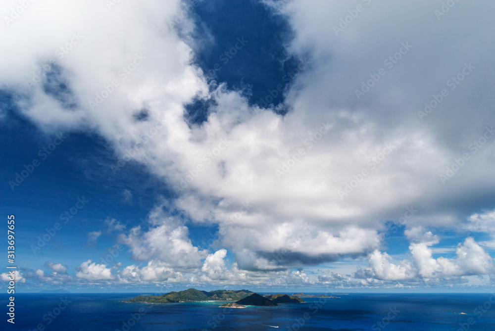 Seychelles island under a massive cloud