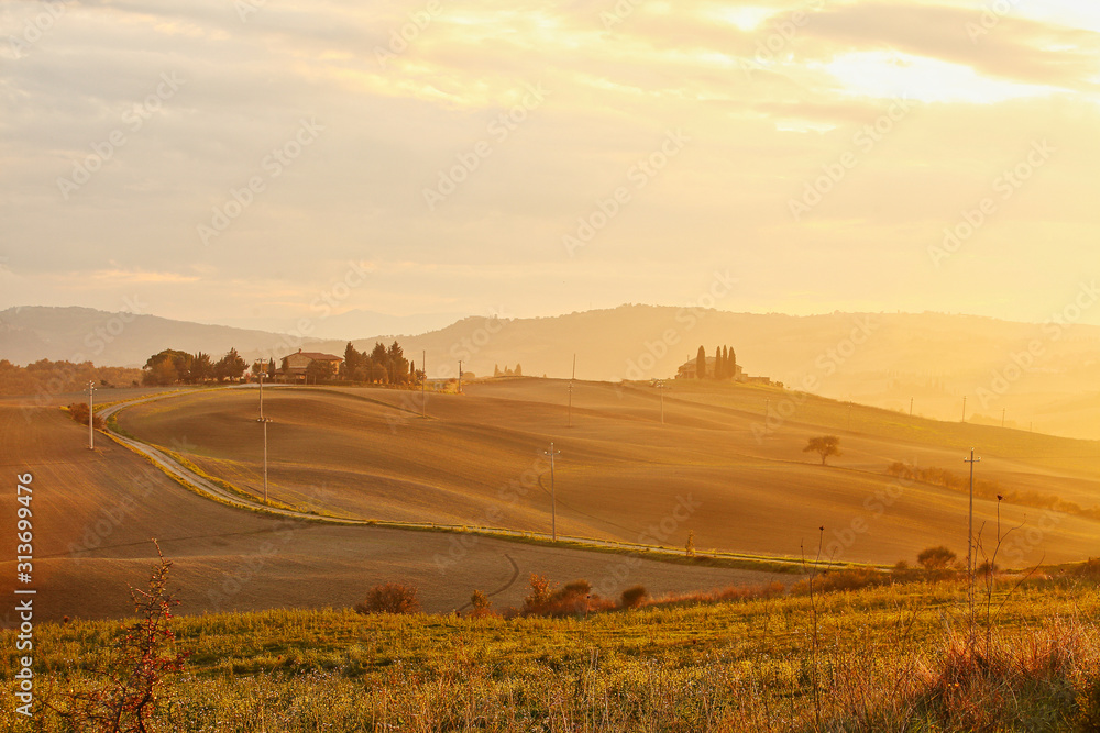 Naklejka premium landscape of hills tuscany in autumn in Italy