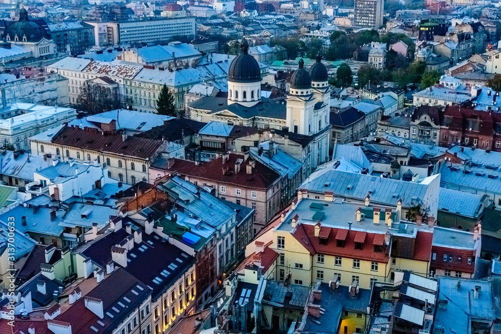 View on a historic center of Lviv at sunset. View on Lvov cityscape from the town hall