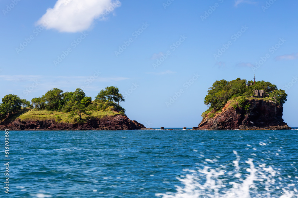 Fototapeta premium Beautiful View of the Coast on the Caribbean Sea during a vibrant sunny day. Taken in Castries, Saint Lucia.